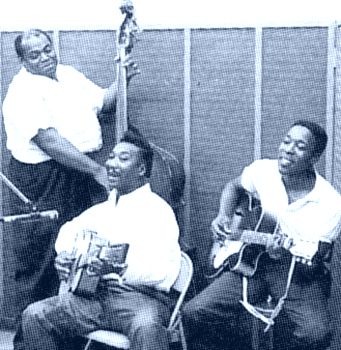 Registro histórico: Dixon, Muddy Waters e Buddy Guy.