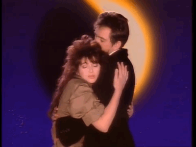 Kate Bush e Peter Gabriel no videoclipe de Don't Give Up